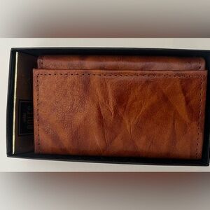 Vintage Rolf’s genuine pigskin billfold in original box